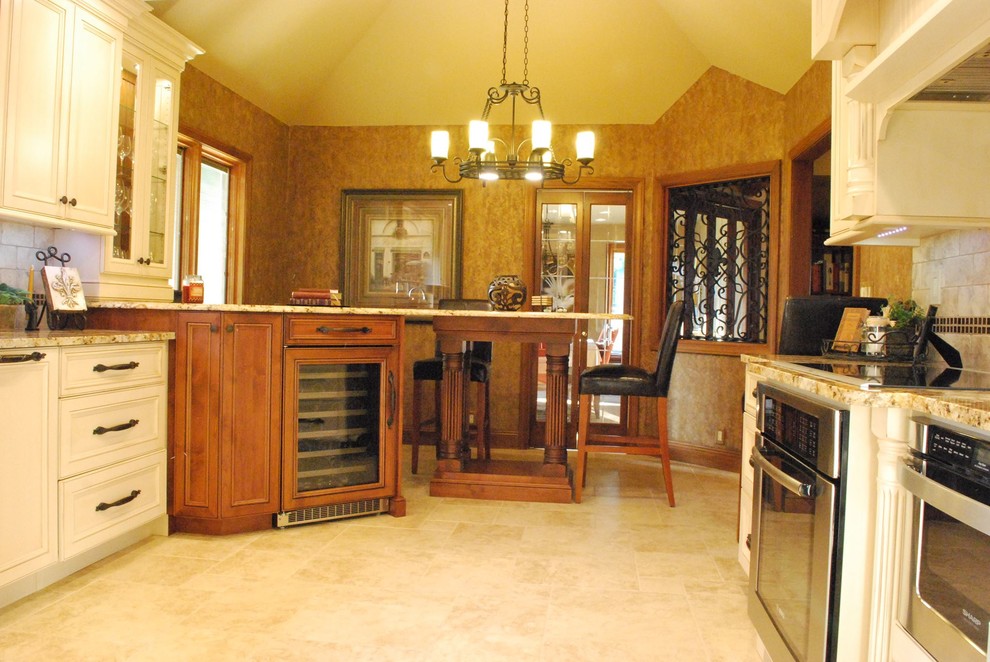 Mid-sized porcelain tile eat-in kitchen photo with beaded inset cabinets, beige cabinets, granite countertops, brown backsplash, ceramic backsplash and stainless steel appliances