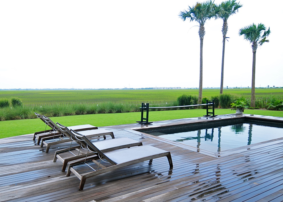 Photo of a classic back swimming pool in Charleston with decking.