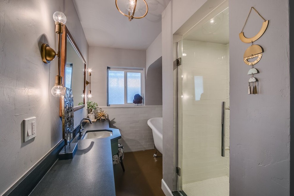 Mid-sized transitional white tile and subway tile concrete floor and brown floor claw-foot bathtub photo in Phoenix with gray walls, an undermount sink and a hinged shower door