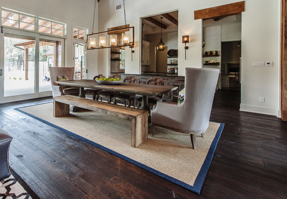 Example of a transitional dining room design in Austin