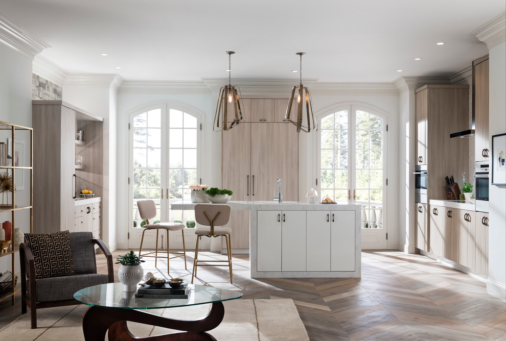 Design ideas for a contemporary eat-in kitchen in Raleigh with flat-panel cabinets, light wood cabinets, white splashback, stainless steel appliances, with island and solid surface benchtops.