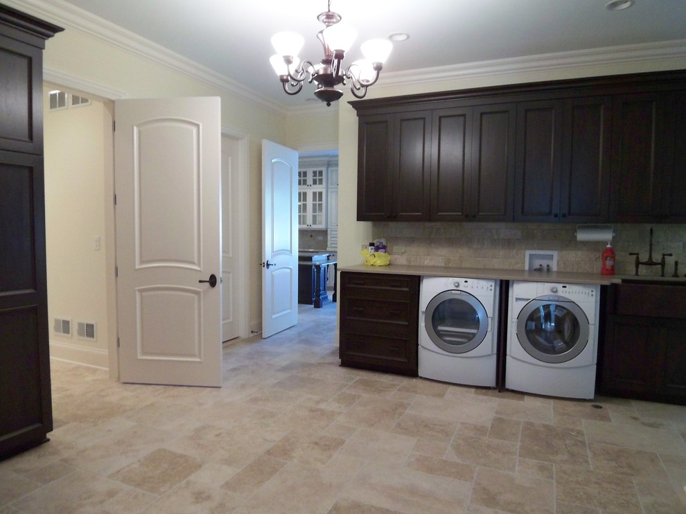 This is an example of a transitional laundry room in Denver.