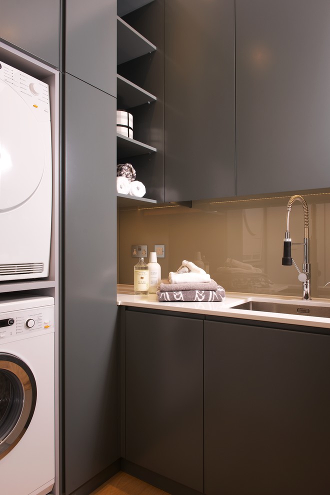 Photo of a contemporary laundry room in London.