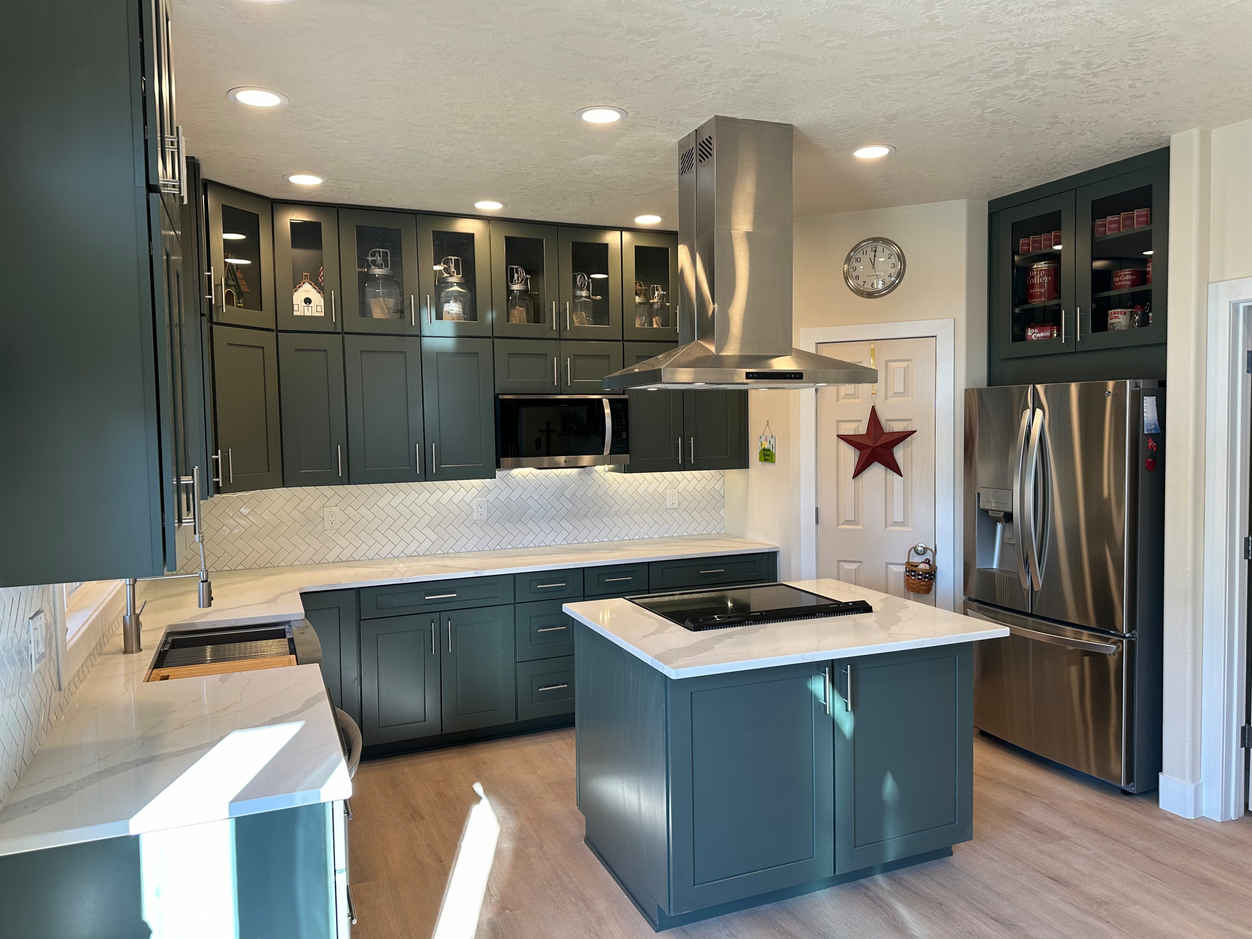 Full kitchen remodel with double stack upper cabinets.