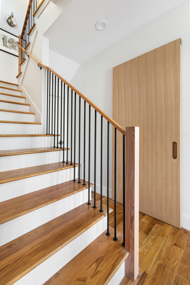 Inspiration for a small transitional staircase remodel in Austin