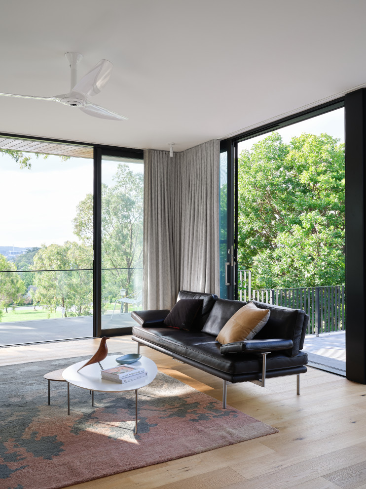 Medium sized modern living room in Canberra - Queanbeyan.