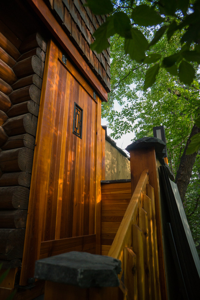 Inspiration for a rustic backyard deck remodel in Calgary