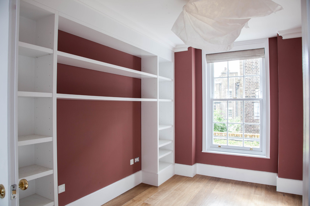 Inspiration for a victorian living room in Other with pink walls.