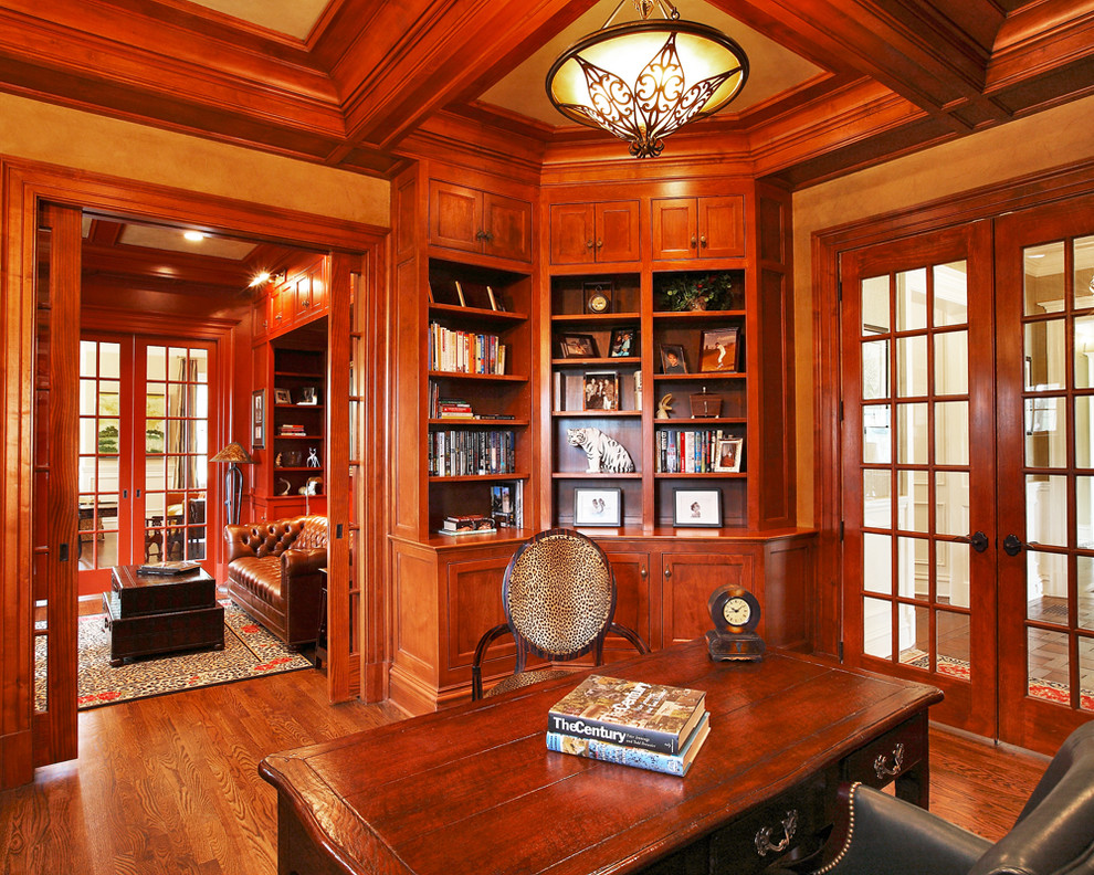 Inspiration for a traditional home office in New York with dark hardwood floors and a freestanding desk.