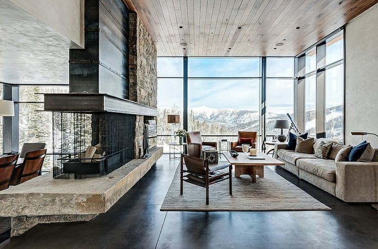 Inspiration for an expansive modern open concept family room in Toronto with white walls, concrete floors, a two-sided fireplace, a metal fireplace surround and grey floor.