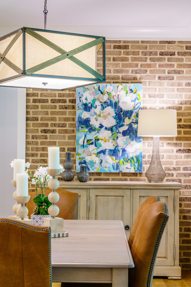 Inspiration for a mid-sized transitional medium tone wood floor and brown floor kitchen/dining room combo remodel with white walls and no fireplace