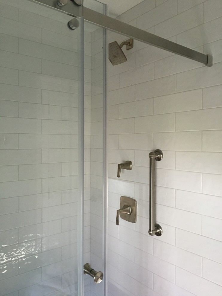 Transitional white tile and cement tile porcelain tile double shower photo