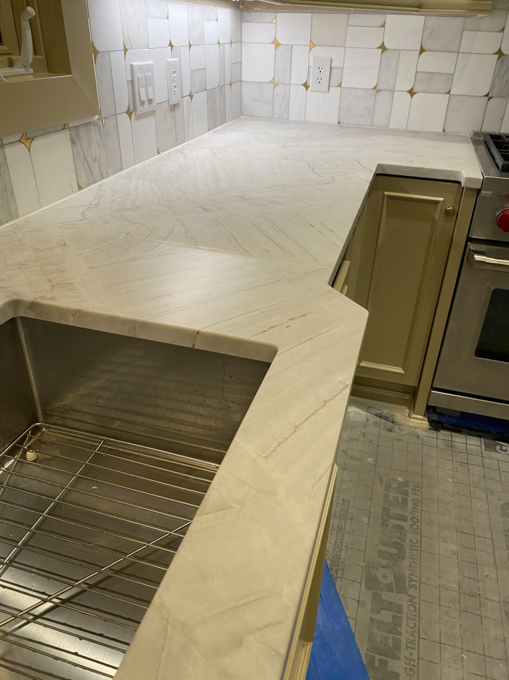 Polishing honed quartzite after installation to obtain subtle sheen