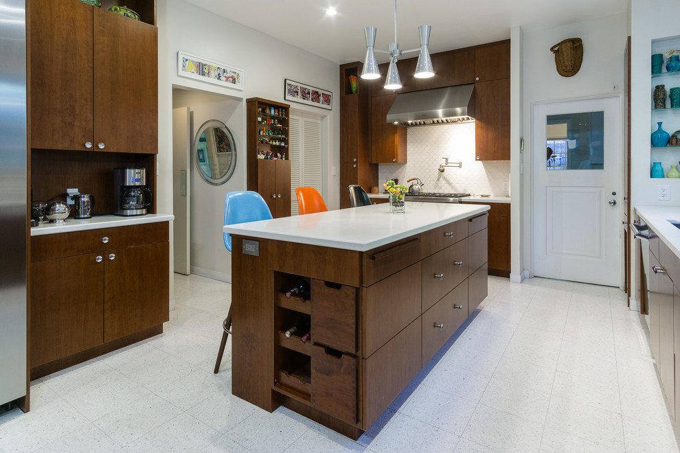 Inspiration for a large midcentury galley separate kitchen in Los Angeles with a single-bowl sink, flat-panel cabinets, medium wood cabinets, quartz benchtops, white splashback, ceramic splashback, stainless steel appliances, linoleum floors, with island and white floor.