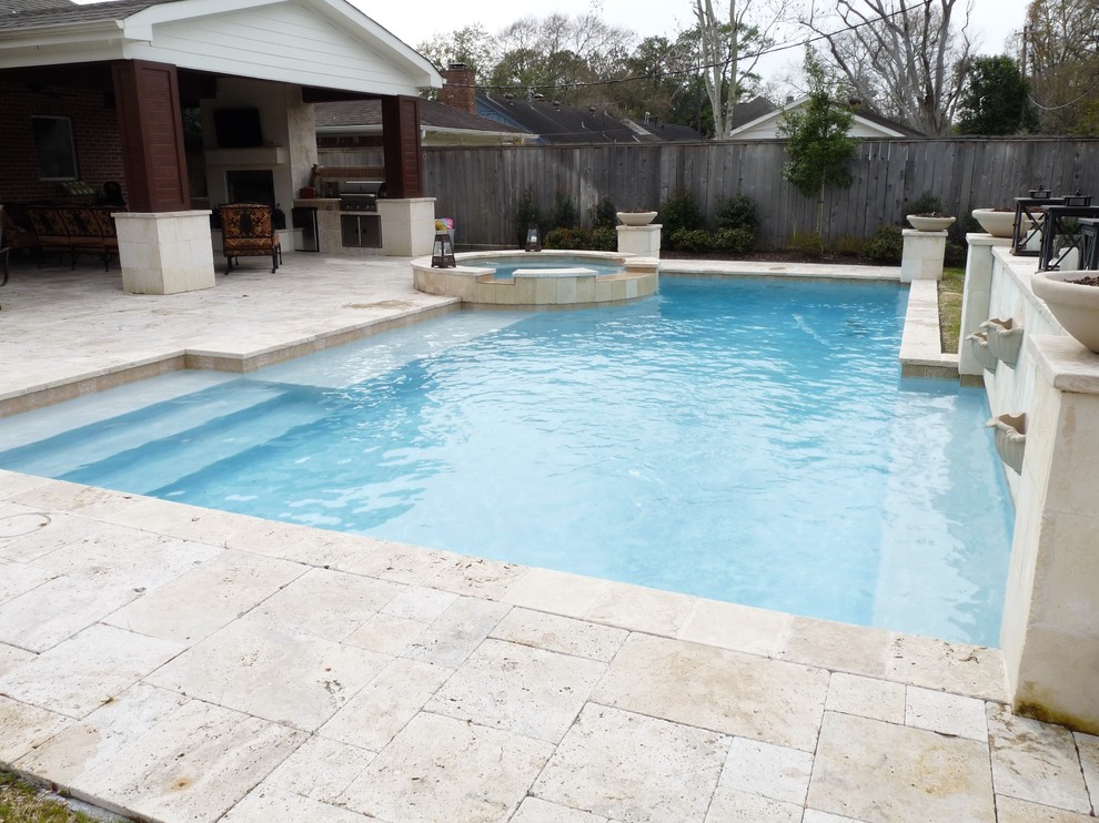Mid-sized transitional backyard rectangular lap pool in Houston with a hot tub and tile.