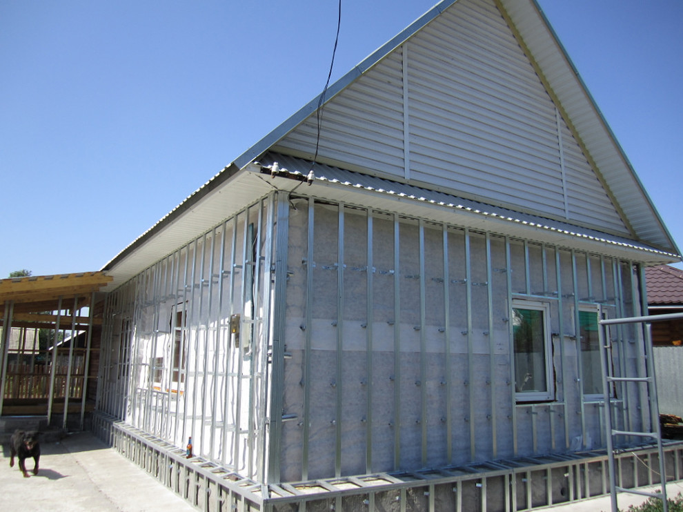 Обшивка дома фасадными панелями