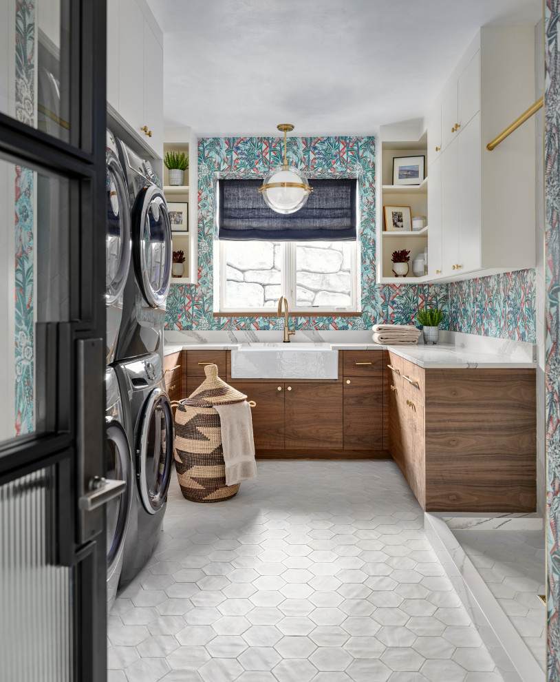 Design ideas for a contemporary utility room in Denver with a stacked washer and dryer and wallpaper.
