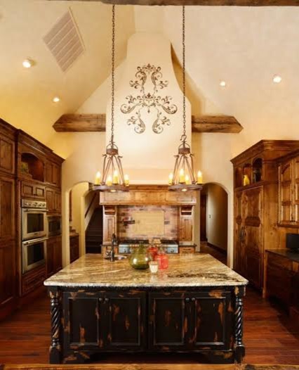 Kitchen - large rustic u-shaped dark wood floor kitchen idea with recessed-panel cabinets, dark wood cabinets, granite countertops and an island