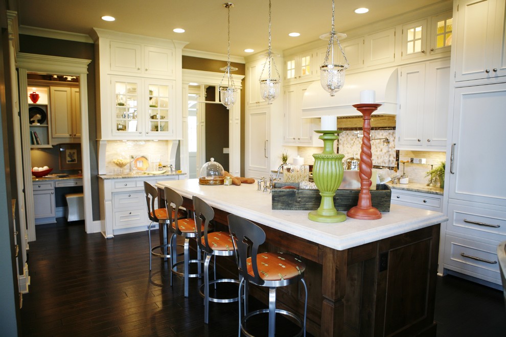 Design ideas for a contemporary kitchen in Indianapolis with a farmhouse sink, white cabinets, marble benchtops, beige splashback, panelled appliances and dark hardwood floors.