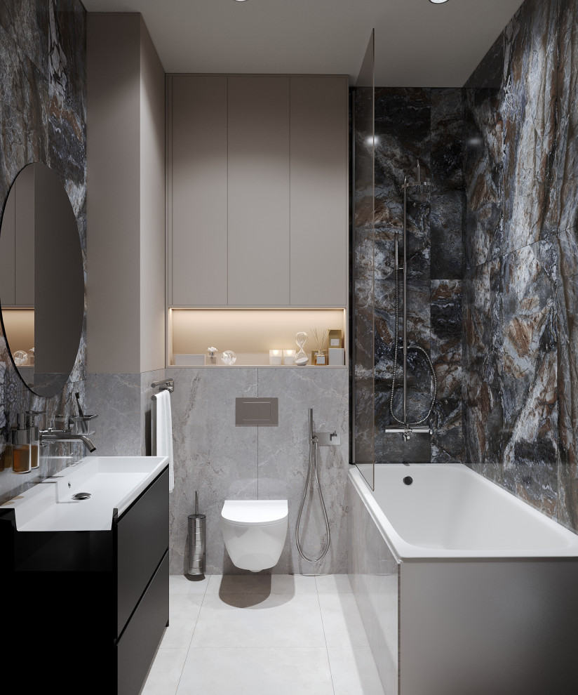 Small contemporary master bathroom in Other with flat-panel cabinets, beige cabinets, a claw-foot tub, a shower/bathtub combo, a wall-mount toilet, porcelain tile, grey walls, porcelain floors, grey floor, a shower curtain, a single vanity and a floating vanity.