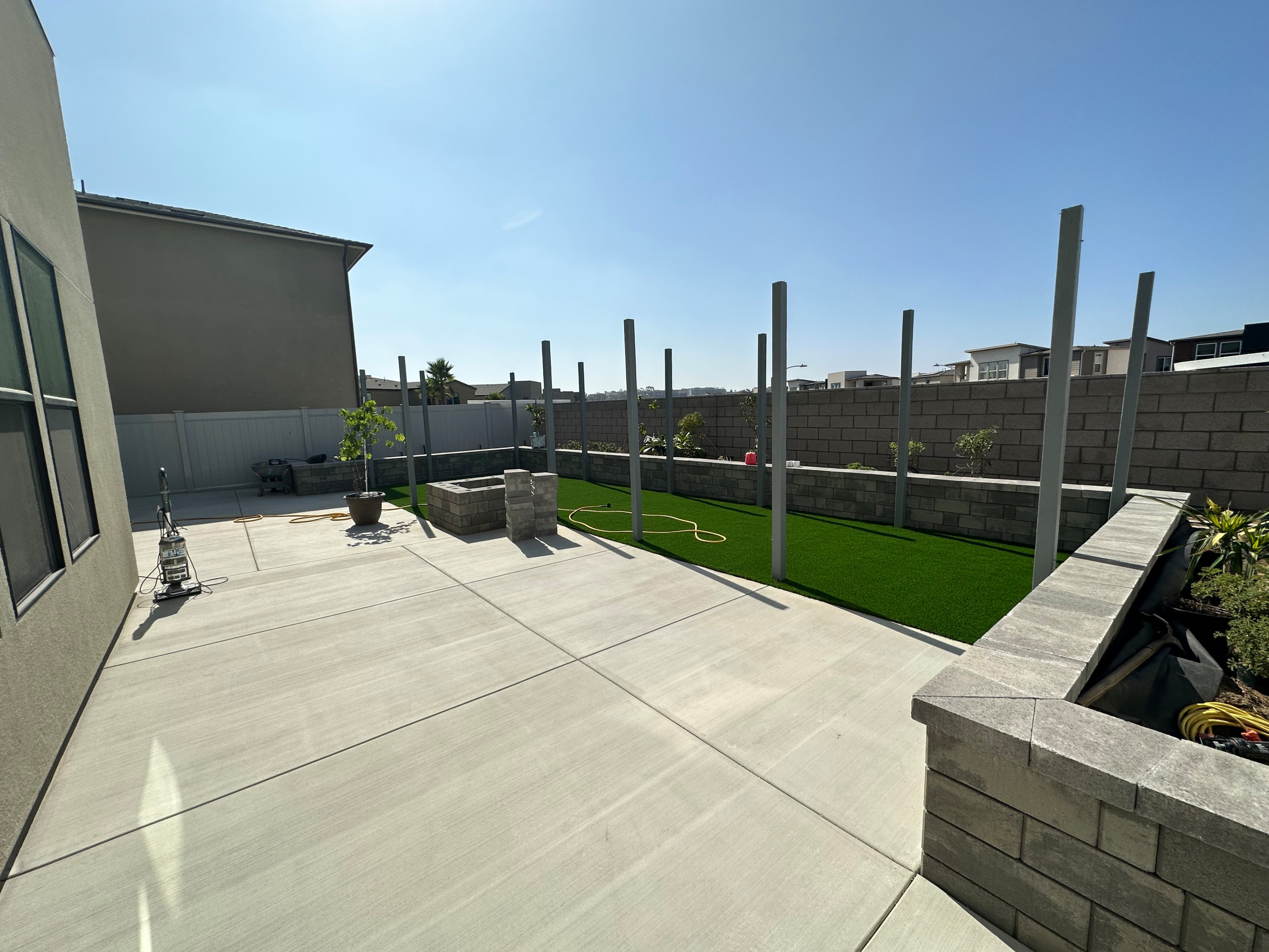 Turf, planter walls, and concrete