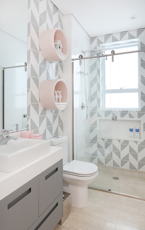 Pale pink and grey bathroom with modern designer tiles
