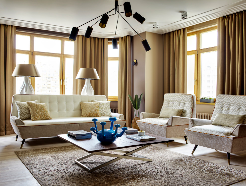 Свежая идея для дизайна: гостиная комната в современном стиле с светлым паркетным полом - отличное фото интерьера