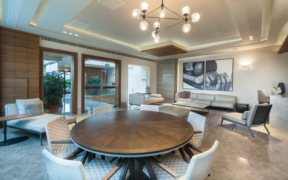 Design ideas for a contemporary living room in Delhi.