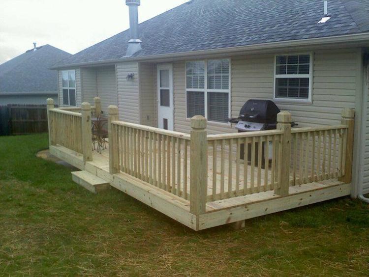 Example of a large arts and crafts backyard balcony deck design with no cover