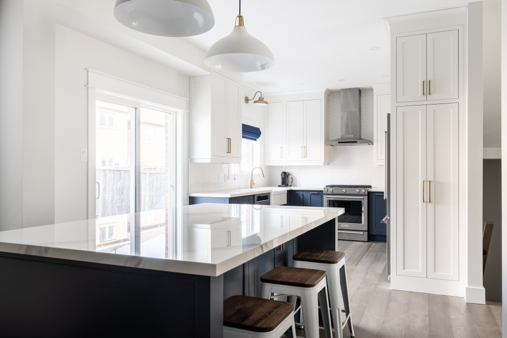 Example of a transitional home design design in Toronto