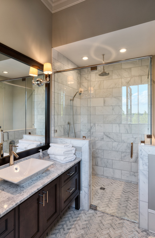 This is an example of a large traditional kids bathroom in Other with recessed-panel cabinets, dark wood cabinets, multi-coloured tile, grey walls, ceramic floors, a vessel sink, granite benchtops, a corner shower, a one-piece toilet and ceramic tile.