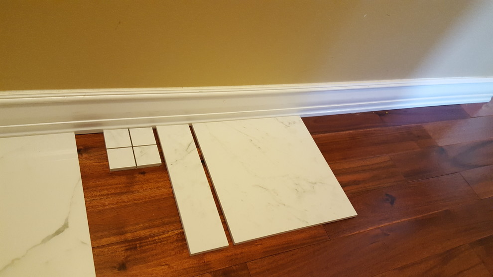 mixing porcelain marble look alike with real marble?