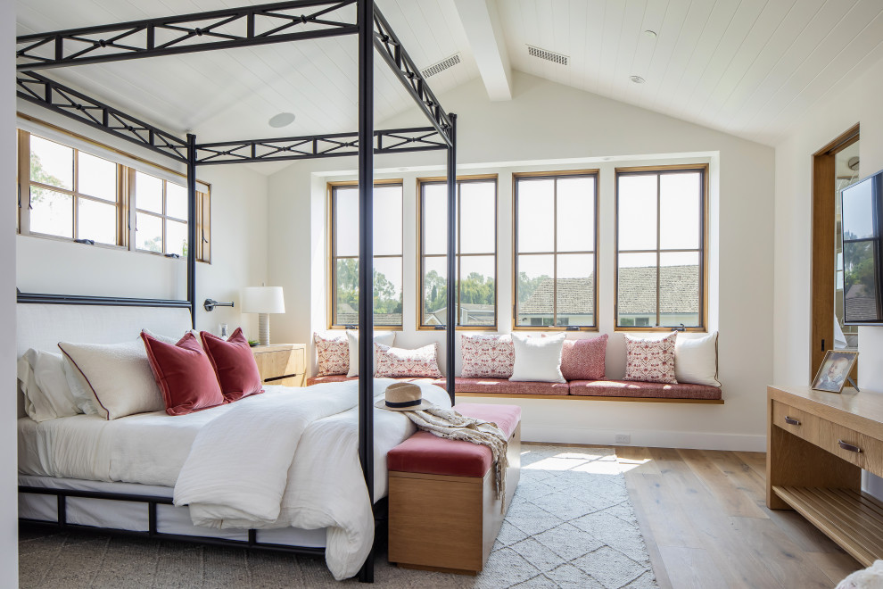 Example of a country bedroom design in Orange County