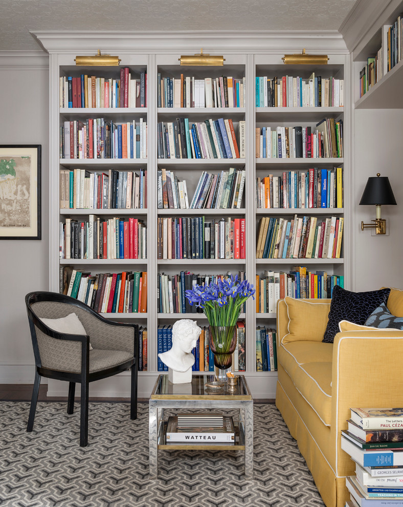 Inspiration for a traditional family room in San Francisco with a library and grey walls.