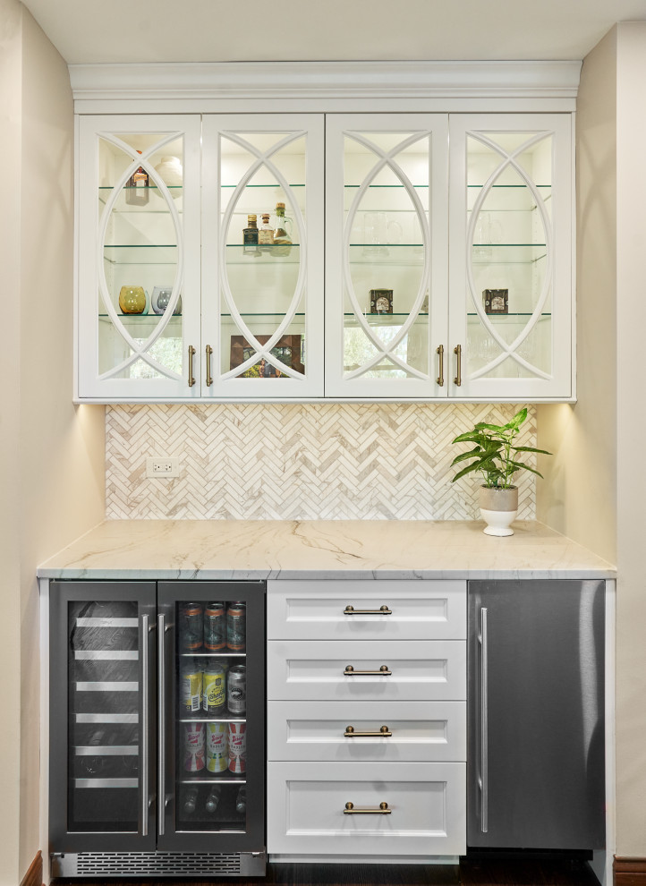 Inspiration for a transitional dry bar remodel in Chicago with glass-front cabinets and white cabinets