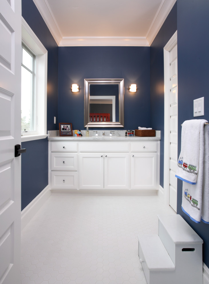 Design ideas for a traditional kids bathroom in San Francisco with recessed-panel cabinets, white cabinets and white tile.