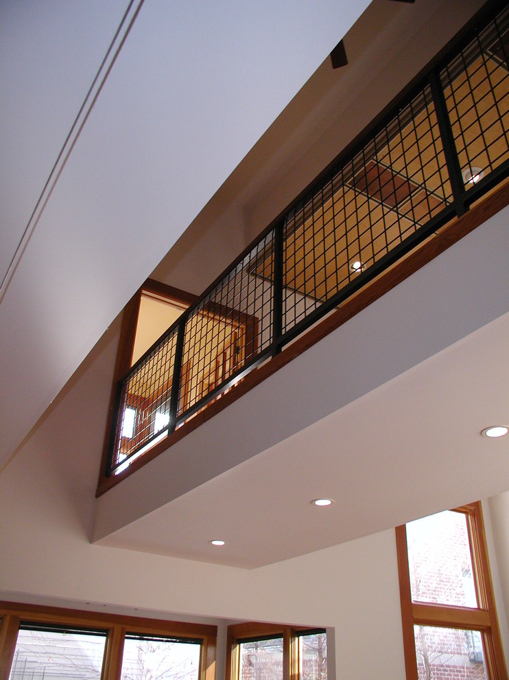 Mid-sized industrial wood straight staircase in Indianapolis with open risers.