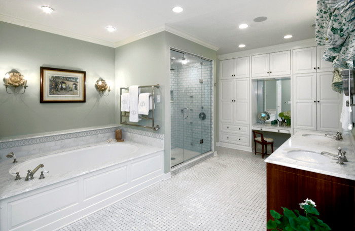 Photo of an expansive traditional master bathroom in Other with a console sink, marble benchtops, a corner tub, a curbless shower, gray tile, cement tile, green walls and ceramic floors.