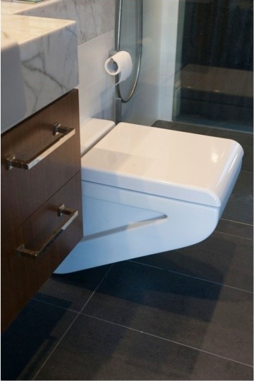 Design ideas for a mid-sized eclectic bathroom in Sydney with an undermount sink, furniture-like cabinets, marble benchtops, gray tile, porcelain tile, grey walls and porcelain floors.