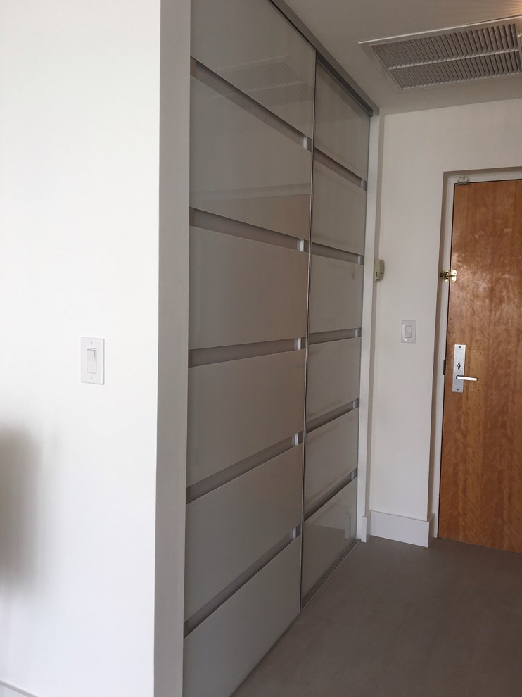 Modern louvered AC closet doors.