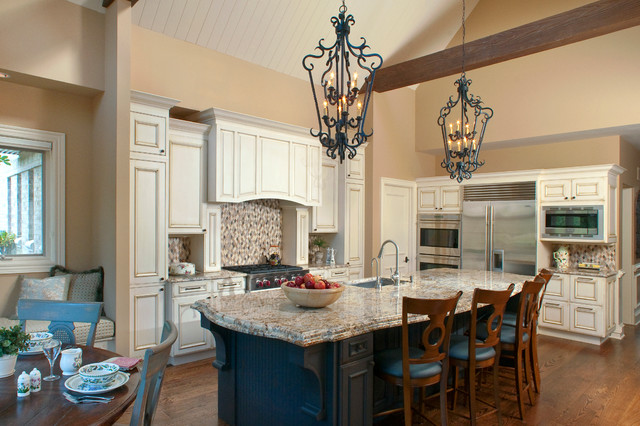 Traditional Kitchen With Vaulted Ceiling And Faux Wood Beams