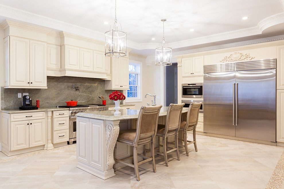 Traditional l-shaped eat-in kitchen in Milwaukee with grey splashback, with island, an undermount sink, beaded inset cabinets, white cabinets, granite benchtops, stainless steel appliances and beige floor.