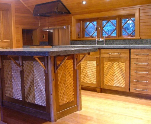 Example of a mountain style kitchen design in Burlington
