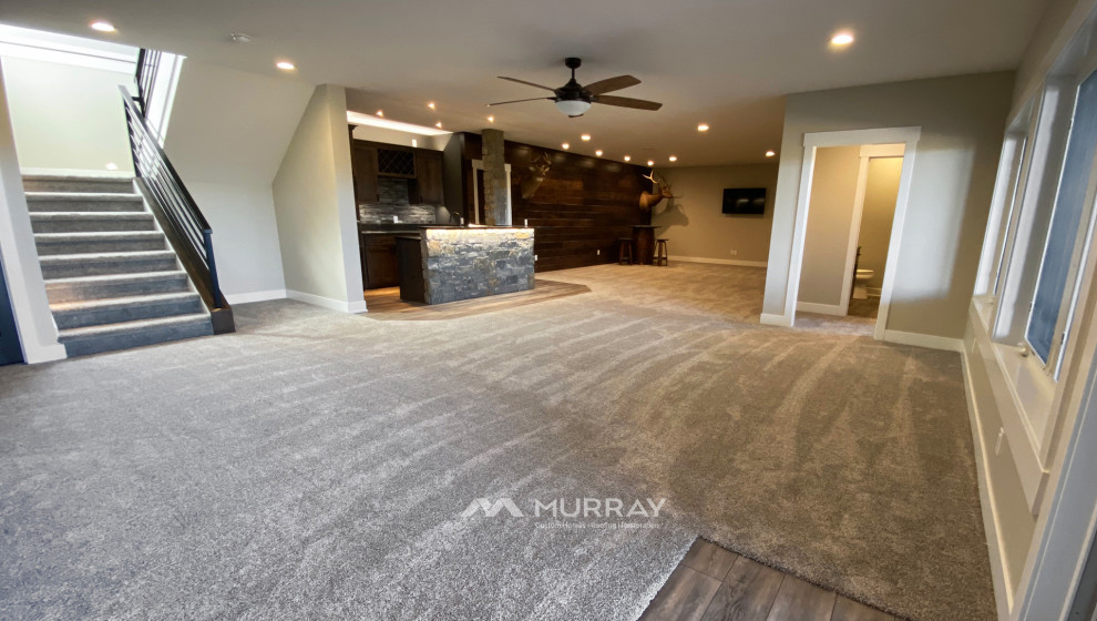 Basement - rustic basement idea in Omaha
