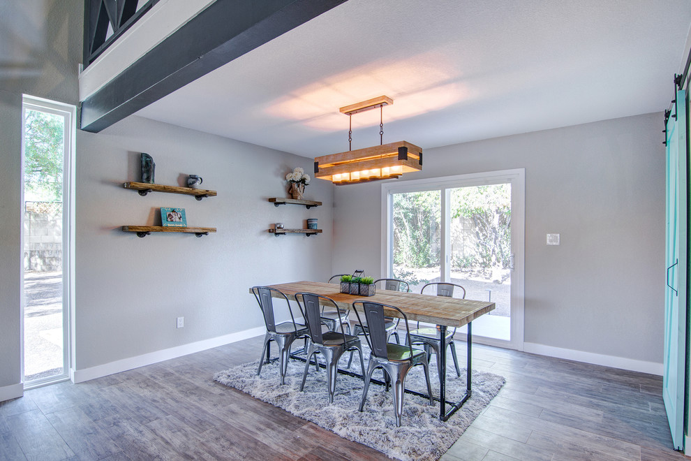 Example of a transitional dining room design in Phoenix