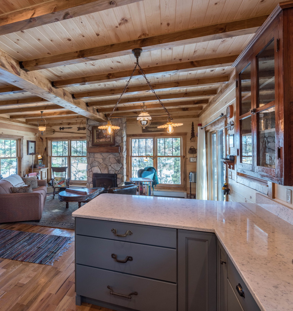 Log Cabin gets a Blue Kitchen Minneapolis by Lampert Lumber Rice