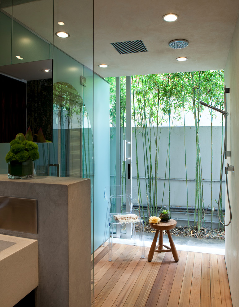 Photo of a contemporary bathroom in Los Angeles with an open shower and an open shower.