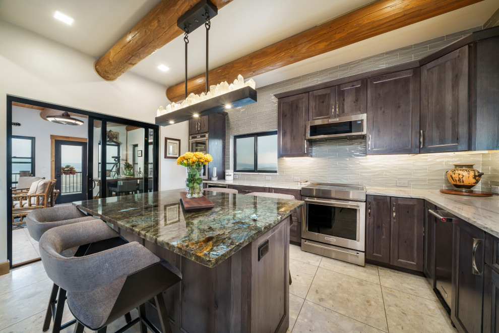 This is an example of a mid-sized country u-shaped separate kitchen in Denver with a single-bowl sink, shaker cabinets, grey cabinets, quartzite benchtops, grey splashback, glass tile splashback, stainless steel appliances, terrazzo floors, with island, white floor, multi-coloured benchtop and exposed beam.
