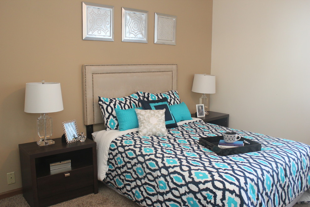 Small transitional master carpeted bedroom photo with beige walls
