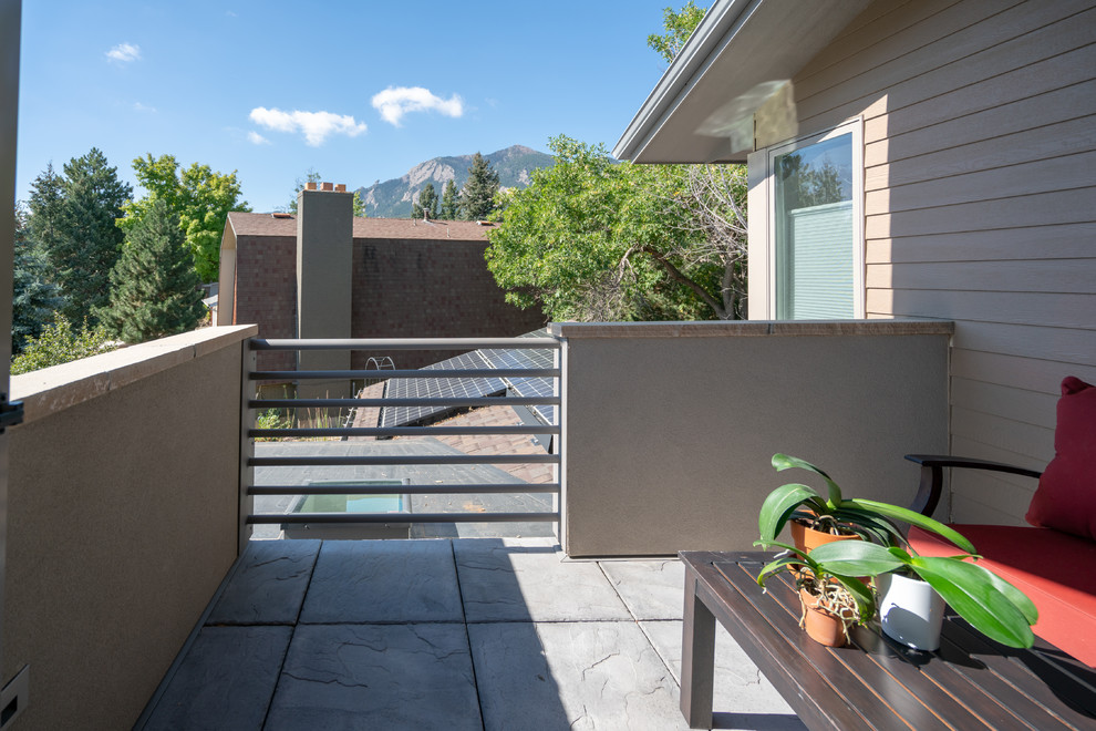 Transitional home design photo in Denver